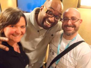 2015 Newbery Medalist Kwame Alexander (center) with fans Michelle Cusolito and Josh Funk