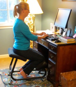 Marti Johnson sitting in her knee chair.