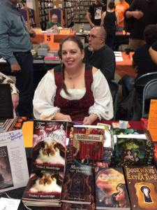 T.J. Wooldridge with her books at the Haverhill Public Library. Photo by Philip Perron.