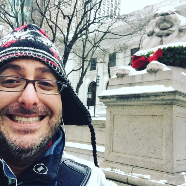 josh with lion statue